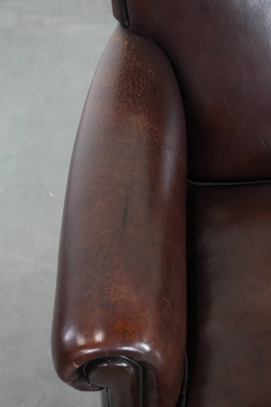 Image 1 of Poltrona in pelle di pecora dall'aspetto senza tempo e dal bellissimo colore scuro