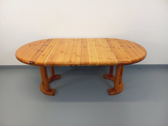 Image 1 of Vintage Scandinavian round dining table by Rainer Daumiller in pine from the 1960s/70s with extensions