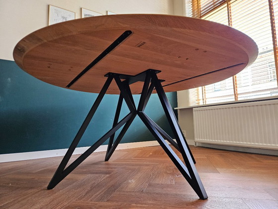 Image 1 of Studio Henk Round Dining Table 160cm Oak with Black Metal Butterfly Base