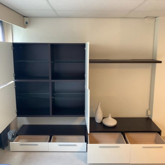 Image 1 of Sleek wall unit with hanging element ALPE