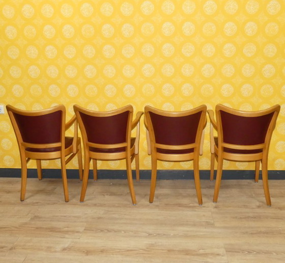 Image 1 of Armchair upholstered spring core skai leather oxblood decorative rivets office chair 60s retro