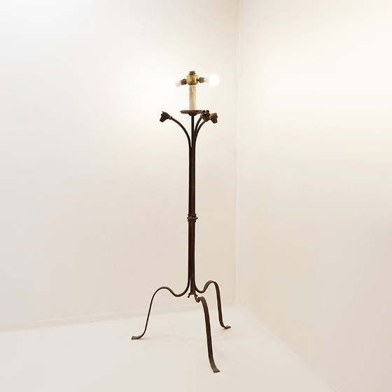 Image 1 of Wrought-iron tripod floor lamp adorned with stylized animal heads