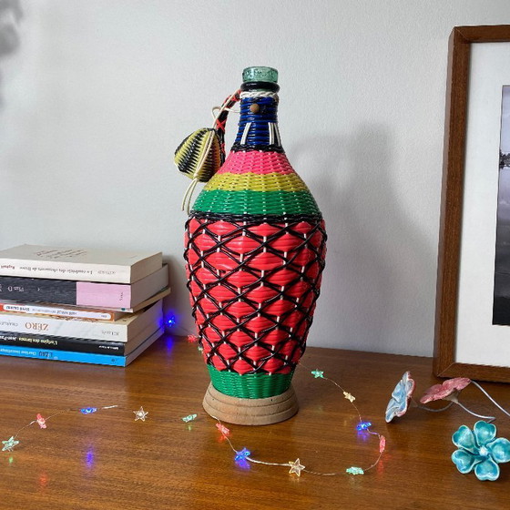 Image 1 of Vintage glass bottle and plastic braided scoubidou