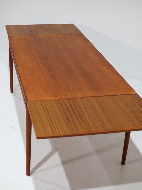 Mesa de comedor rectangular extensible de Johannes Andersen, teca danesa, década de 1960. – Mesas de comedor (photo 14 of 17)