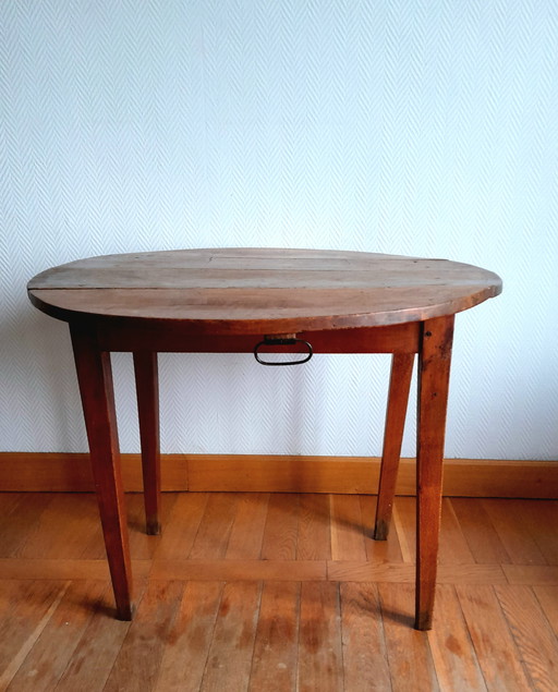 Antieke ronde notenhouten tafel met kleppen