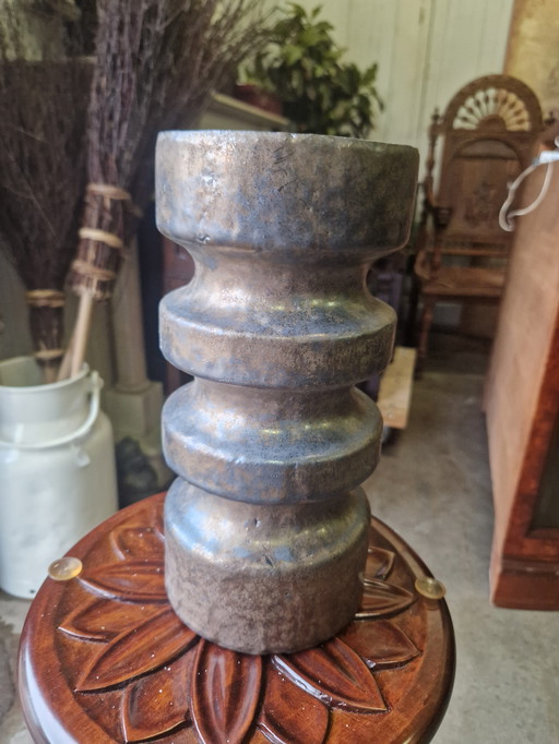 Beautiful earthenware bronze-colored vase