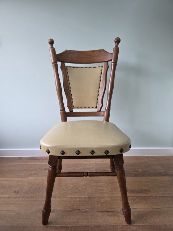 Image 1 of Set of 2 solid oak chairs with decorative nails