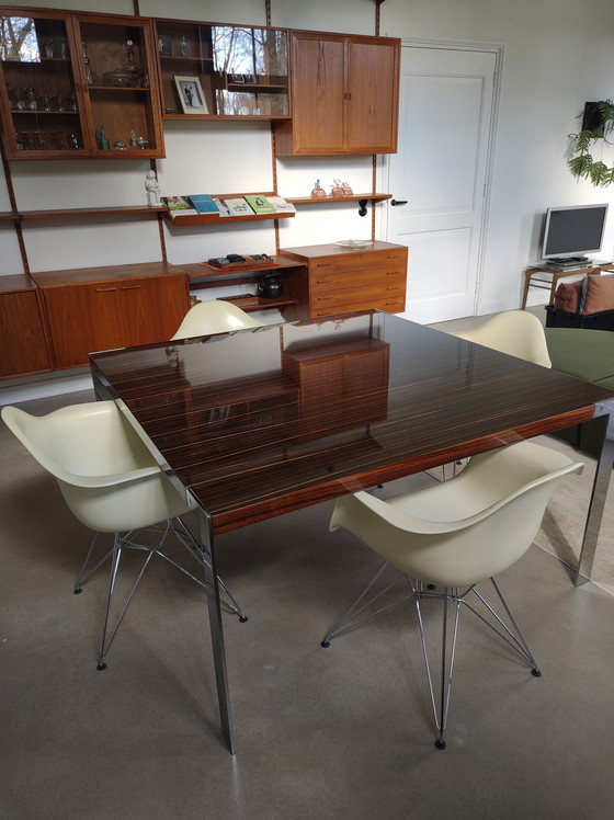 Image 1 of Table Liko Ebony With Heavy Chrome Legs From The Brand Desalto
