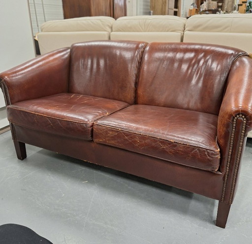 Sofá club de dos plazas de piel de oveja