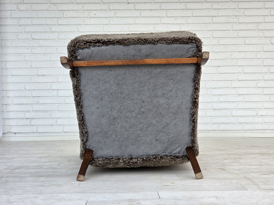 Image 1 of 1960s Reupholstered Danish Armchair with Stool, Genuine Sheepskin