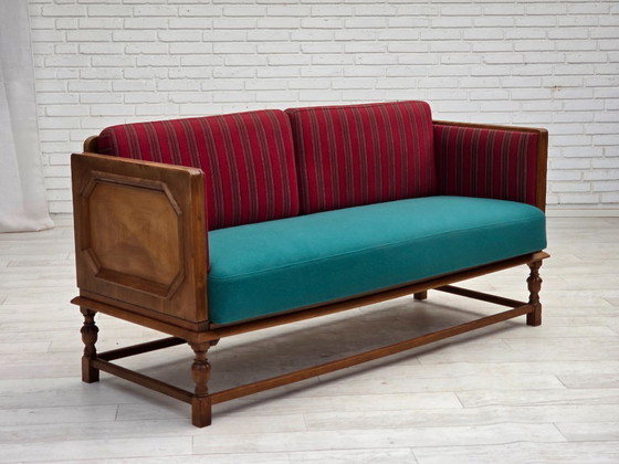 Image 1 of 1950s, Danish 2 seater drop arm sofa, original striped red furniture wool, oak wood.