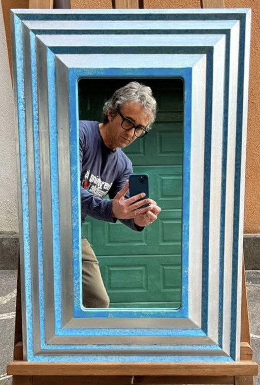 Designer mirror measures 21 x 45 cm, finished size in frame 43 x 67 cm