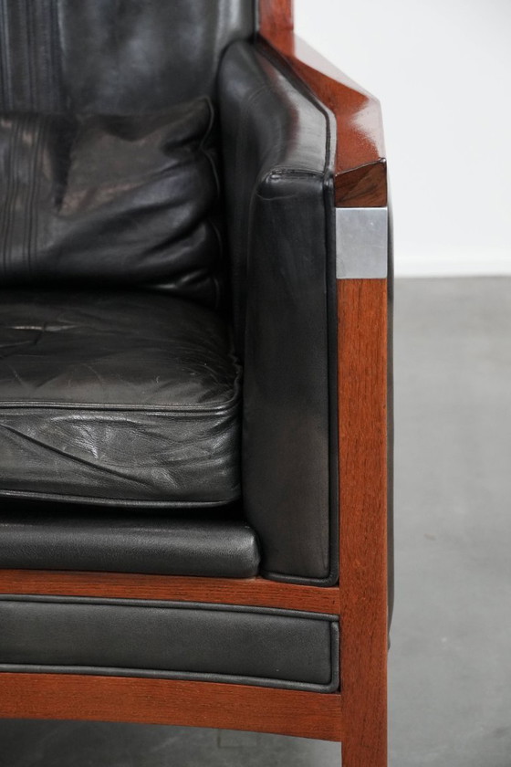 Image 1 of Black cowhide and wooden Art Deco design armchair by Schuitema from the Decoforma series with decorative cushion
