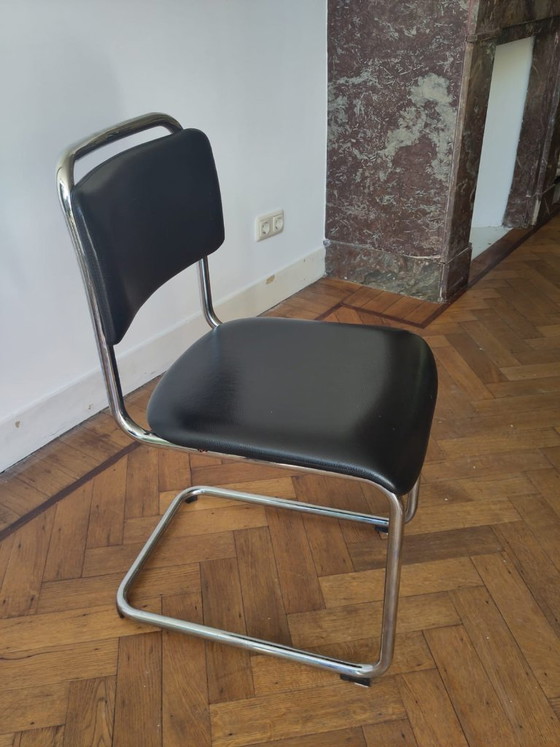 Image 1 of Set van 6 Dutch Originals Gispen Buisframe Eetkamerstoelen (zwart, groen, grijs/blauw)