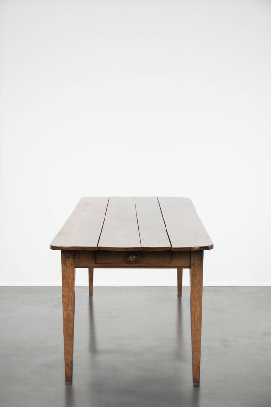 Image 1 of Antique 6 to 8 person dining table with two functional drawers