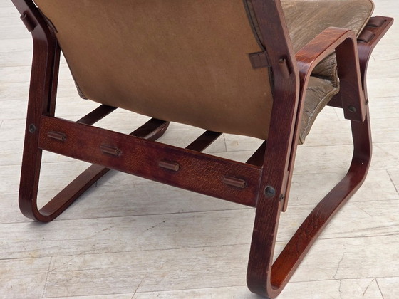 Image 1 of Fauteuil lounge norvégien des années 1970, revêtement en cuir marron.