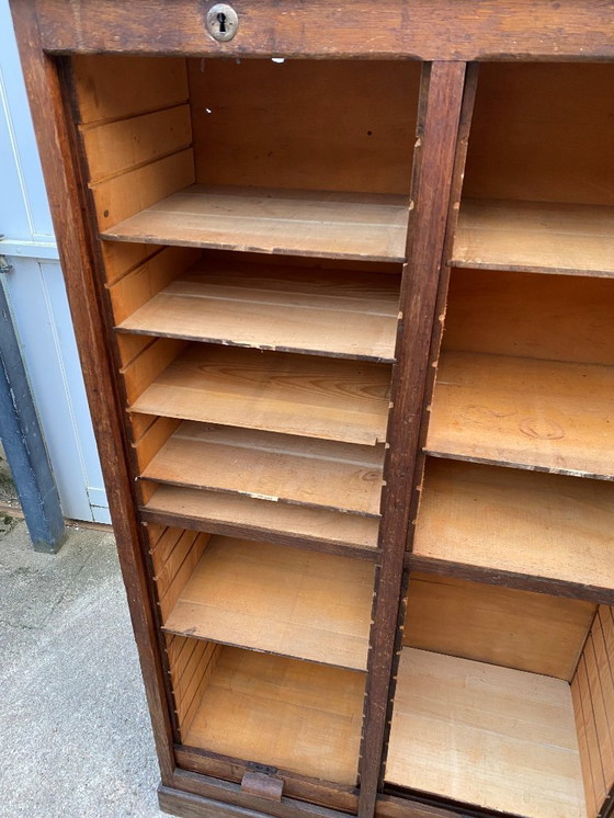 Image 1 of Eikenhouten archiefkast met drie kolommen en gordijn uit de jaren 50