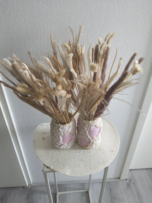 Vases star and heart with artificial flowers