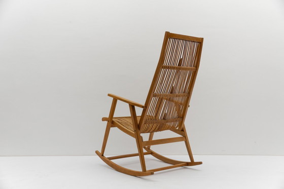 Image 1 of Sedia a dondolo in legno e rattan della Deutsche Werkstätten Hellerau, anni '60