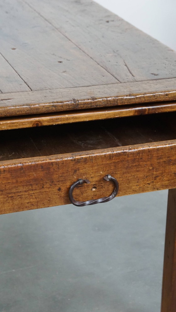Image 1 of Antique French dining table from the early 19th century with two drawers and a breadboard / extendable top