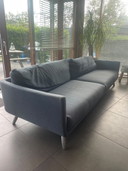 Divano a 5 posti con pouf
