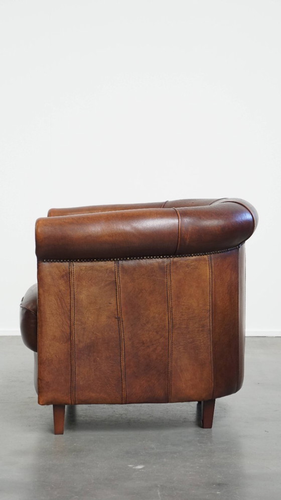 Image 1 of Sheep Leather Club Chair in a Dark Cognac Color