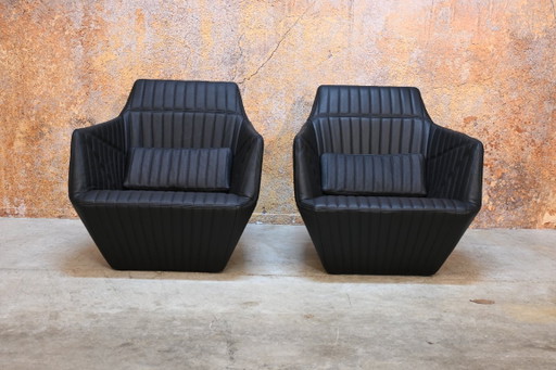 Two newly upholstered Ligne Roset Facet design armchairs – fauteuils, Leather