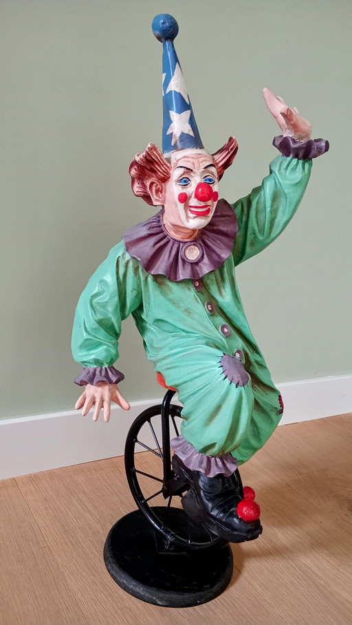 Vintage sculpture, Clown on unicycle (Jun Asilo)