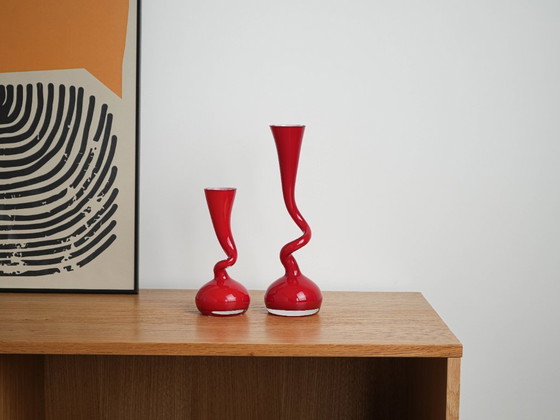 Image 1 of Red vase, Swing Vase, Danish design, manufactured by Normann Copenhagen, designed by Britta Bonnesen