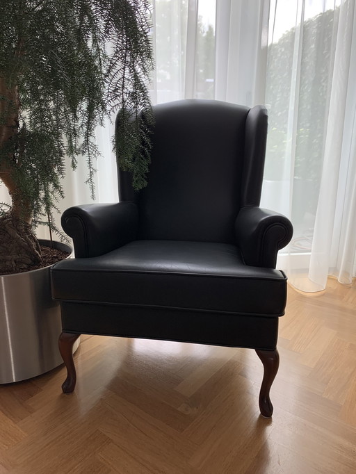 Fauteuil en cuir pointu