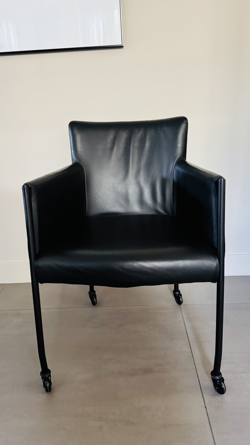 8 Piet Klerkx eetkamerstoelen met armleuning, leer