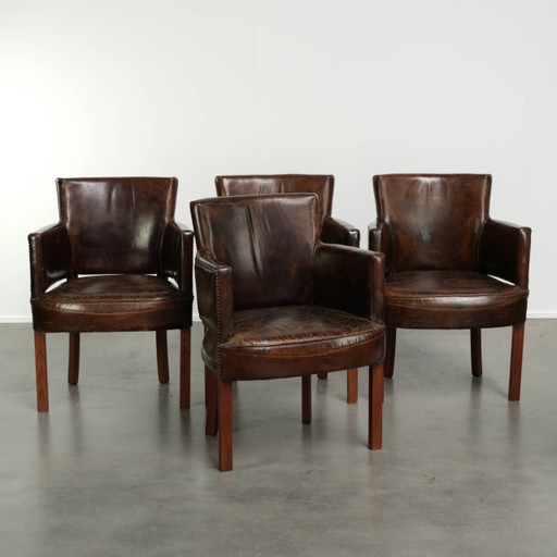 4x chaise de salle à manger en cuir de vachette grainé dans un coloris foncé avec un look intemporel