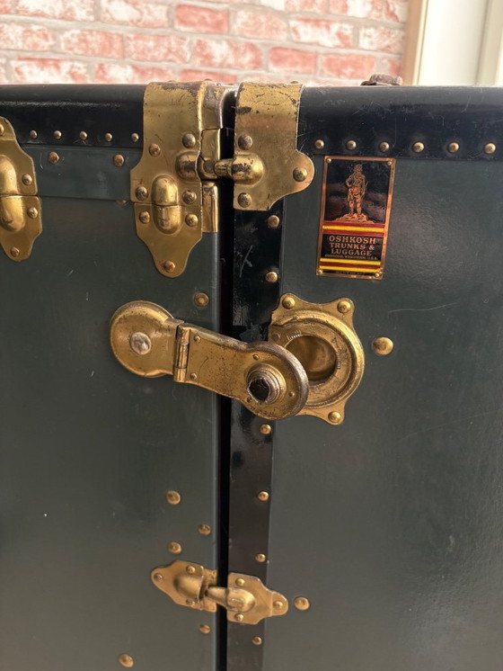 Image 1 of Oshkosh stoombootkoffer uit 1920