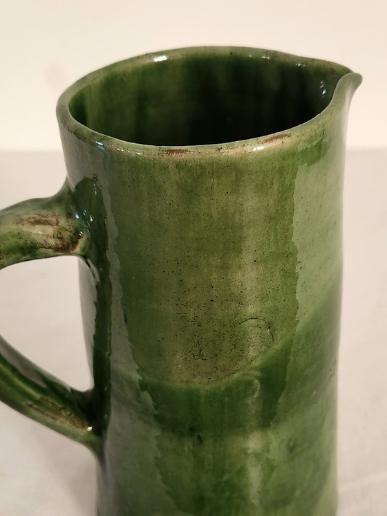 Image 1 of Large vintage green glazed ceramic pitcher