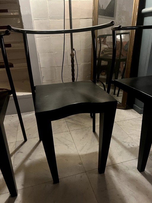 4 chaises noires Dr. Glob - Design by Philippe Starck