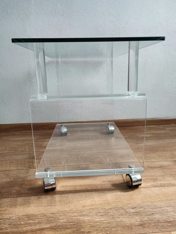 Image 1 of Carrello del tavolo dei mobili TV in plexiglass acrilico con piano in vetro su ruote