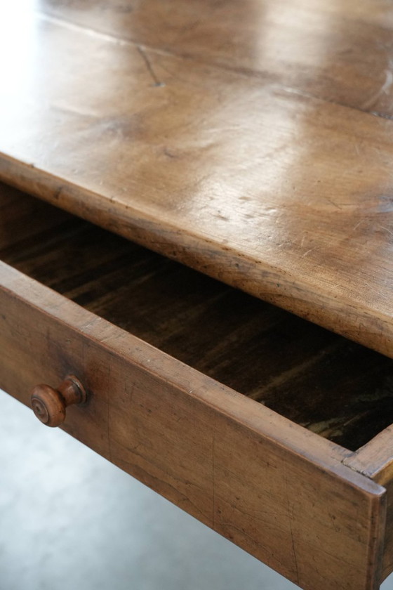 Image 1 of Early 19th century French fruitwood dining table with two drawers