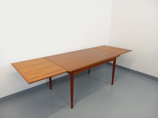 Scandinavian 60's vintage Dyrlund rectangular teak dining table with extensions