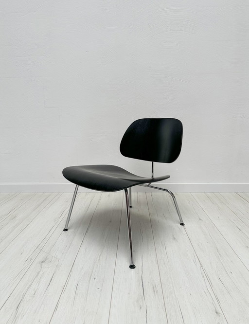 Sillón Eames LCM de madera contrachapada, estilo vintage de los años 70, diseñado por Charles y Ray Eames para Vitra.