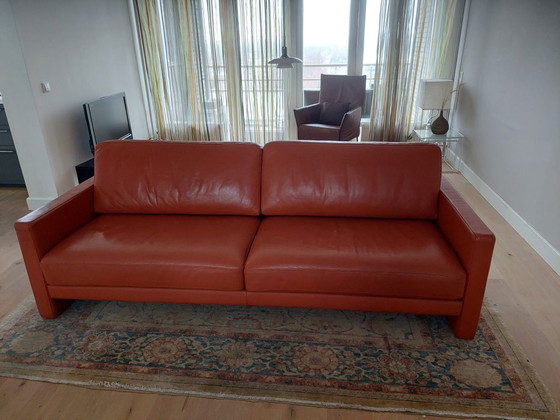 Image 1 of Rolf Benz 4-seater leather sofa, orange/terracotta.