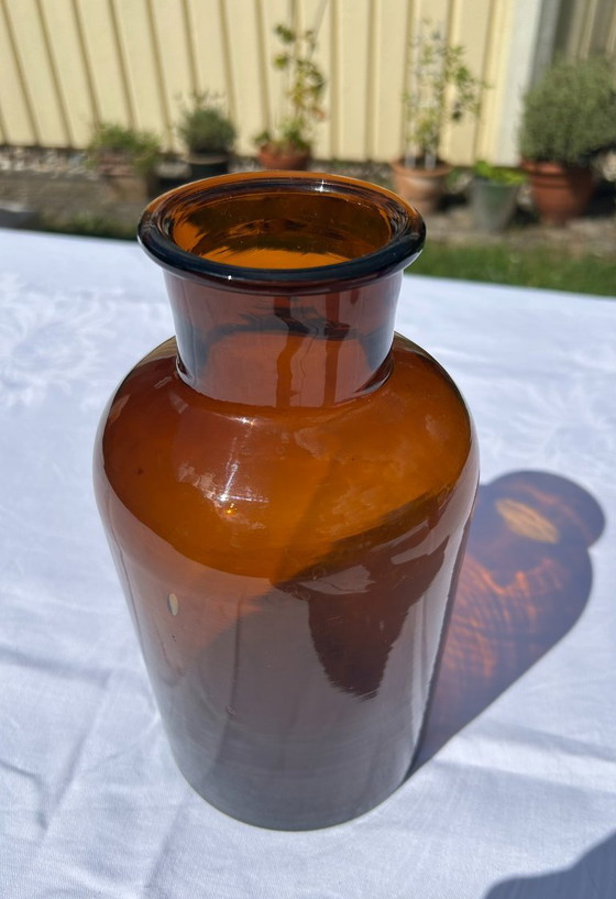 Image 1 of 2 bottles: Apothecary bottle + Elegant turquoise glass bottle, vintage turquoise