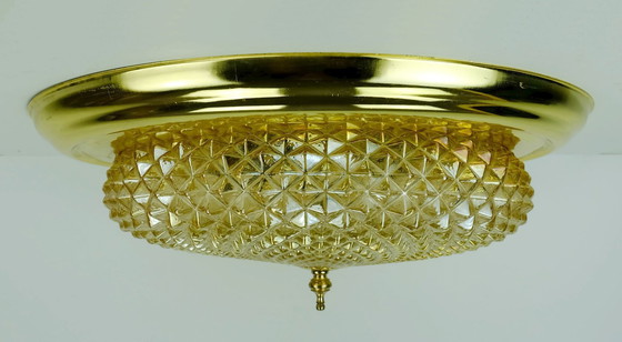 Image 1 of mid century ceiling LAMP flush mount textured amber glass and brass 1970s