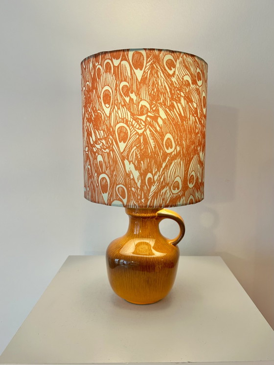 Image 1 of Lampada vintage arancione brillante, senza fili, adatta per uso esterno.
