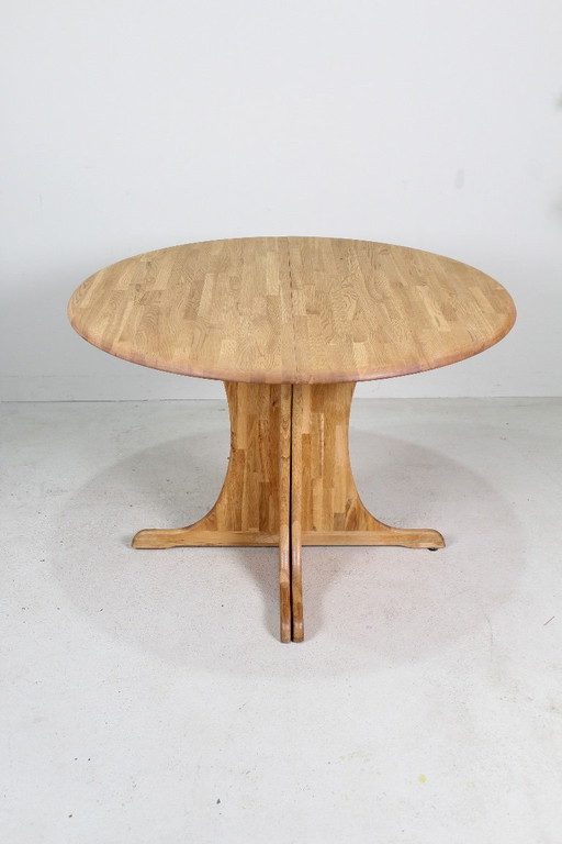 Vintage Danish wooden extendable dining table