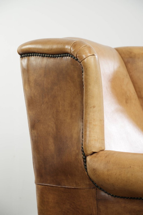 Image 1 of Lichte rundleren oorfauteuil met een goed zitcomfort