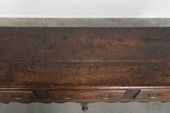 Image 1 of Large English antique oak sideboard/dresser with 3 working drawers from the early 18th century with a beautiful patina