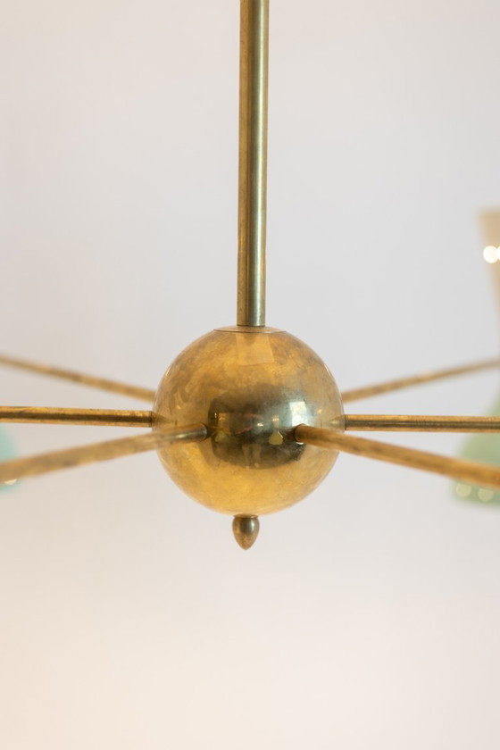 Image 1 of Stralende diabolokroonluchter met 12 kaarslampen. Eigentijds.