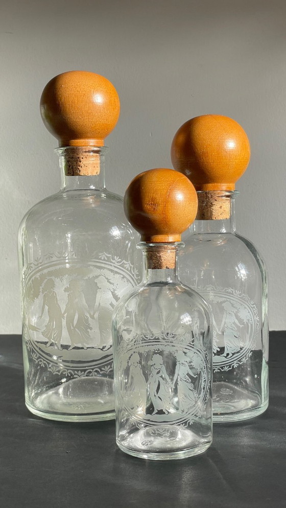 Image 1 of Vintage Engraved Glass and Wood Bottles