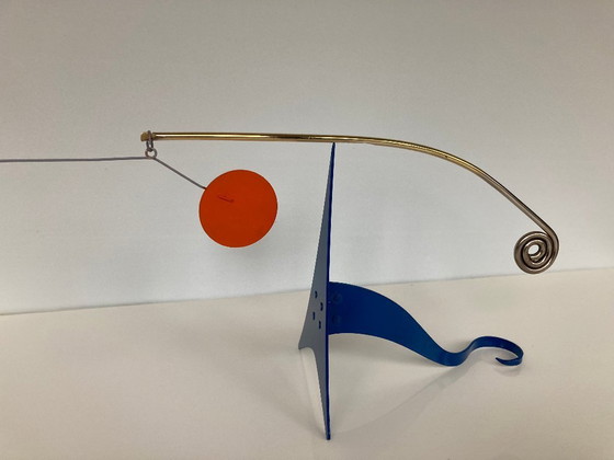 Image 1 of Blue curly stabilize