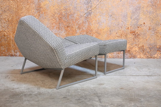 Image 1 of Sillón Leolux Wibber único en tela blanca y negra con otomana.